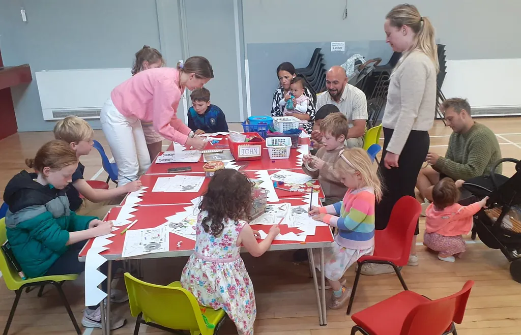 Sunday Club members and helpers busy on a creative activity